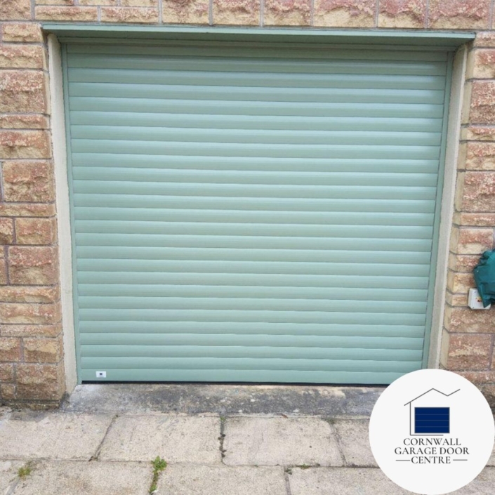 Chartwell Green SWS Original Insulated Roller: A sleek and stylish roller door in a soft, muted green hue, providing both insulation and security for your property. Its durable construction and classic design blend seamlessly with various architectural styles, enhancing the aesthetic appeal of any space.