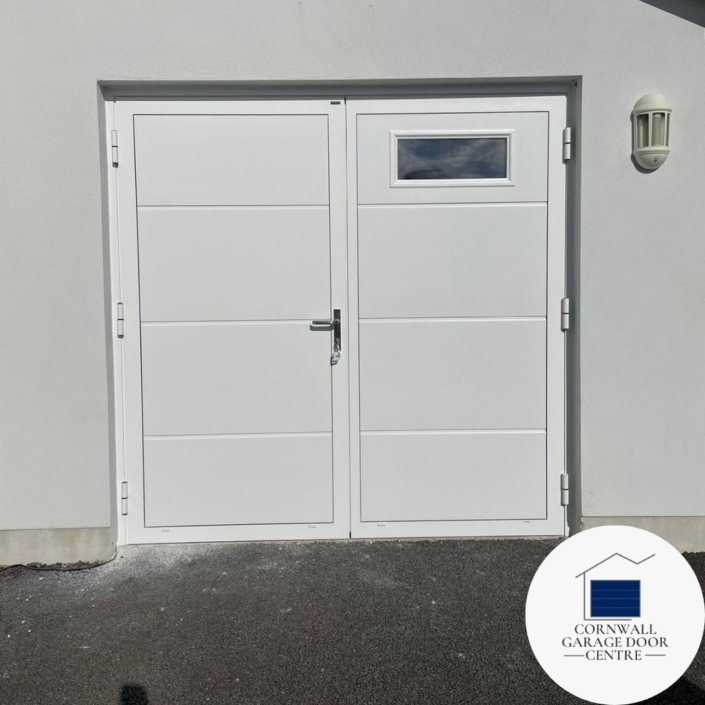 White insulated side-hinged doors featuring a sleek solid horizontal design with a rectangular window panel. The doors offer both style and functionality, providing efficient insulation while allowing natural light to filter through. Perfect for residential or commercial spaces seeking a modern aesthetic with practicality.