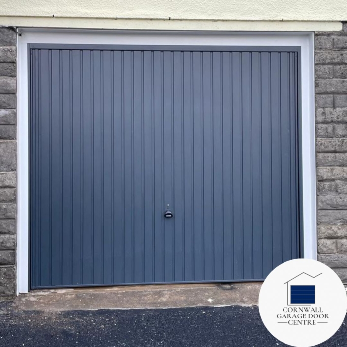 Anthracite Grey Garador Carlton Garage Door: A sleek and modern garage door in anthracite grey color. Features subtle panel detailing and smooth surface finish, adding contemporary elegance to any home exterior.
